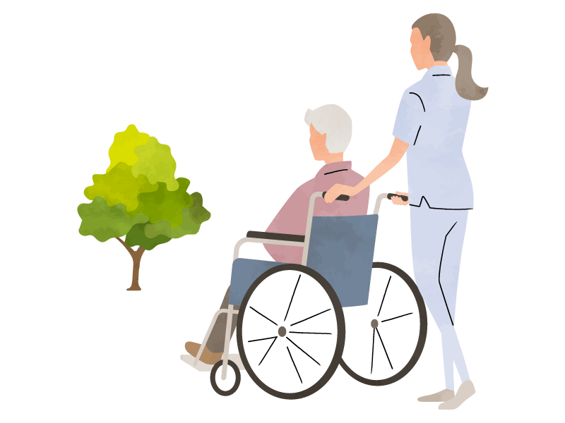 車いすを押す女性スタッフ